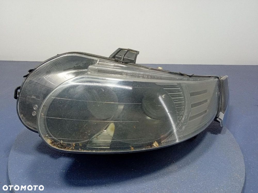 SAAB 9-5 I LIFT 05-10 REFLEKTOR LEWY LAMPA H7 EU 89101416-006-SX - 1