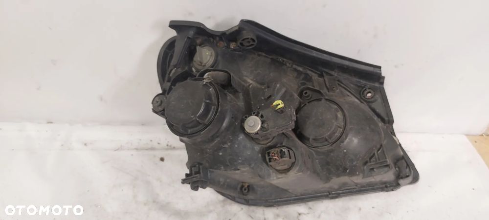 .  PRZOD PRZEDNIA LAMPA LEWA KIA CARENS 3 - 3