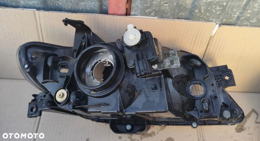 Reflektor lewy Lampa lewa Mazda 323F 323 F 2001- Jasna EU - 2