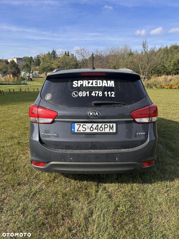 Kia Carens - 4