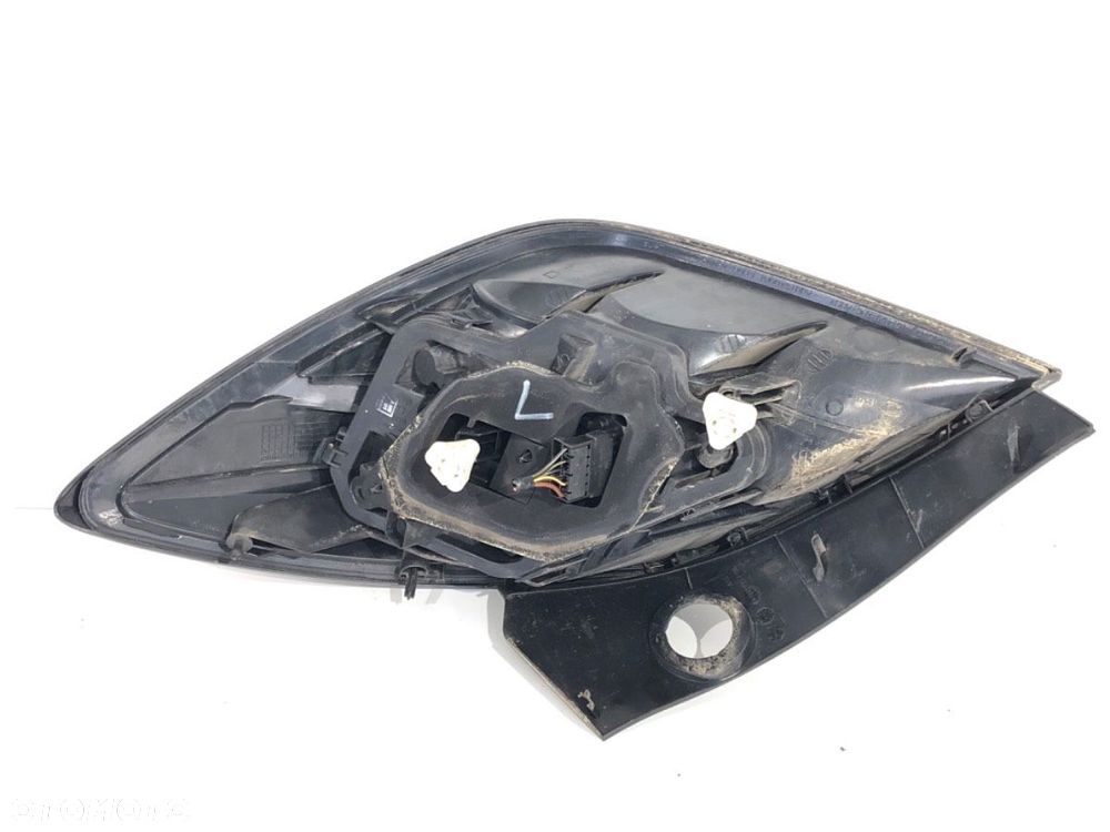 LAMPA LEWY TYŁ  OPEL ASTRA H GTC (A04) 2005 - 2010 1.4 (L08) 66 kW [90 KM] benzyna 2005 - 2010 - 6