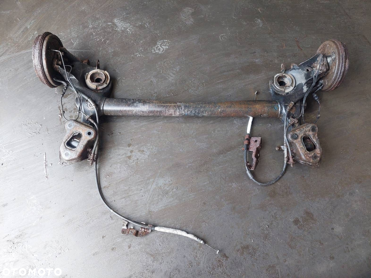 BELKA OŚ ZAWIESZENIA TYŁ BĘBNY Z ABS OPEL CORSA D - 4