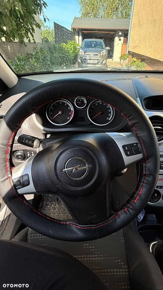 Opel Corsa 1.2 16V Enjoy - 8