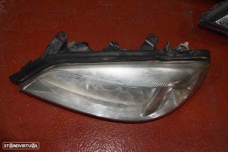 FAROL ESQUERDO OPEL ASTRA G BERLINA - 1