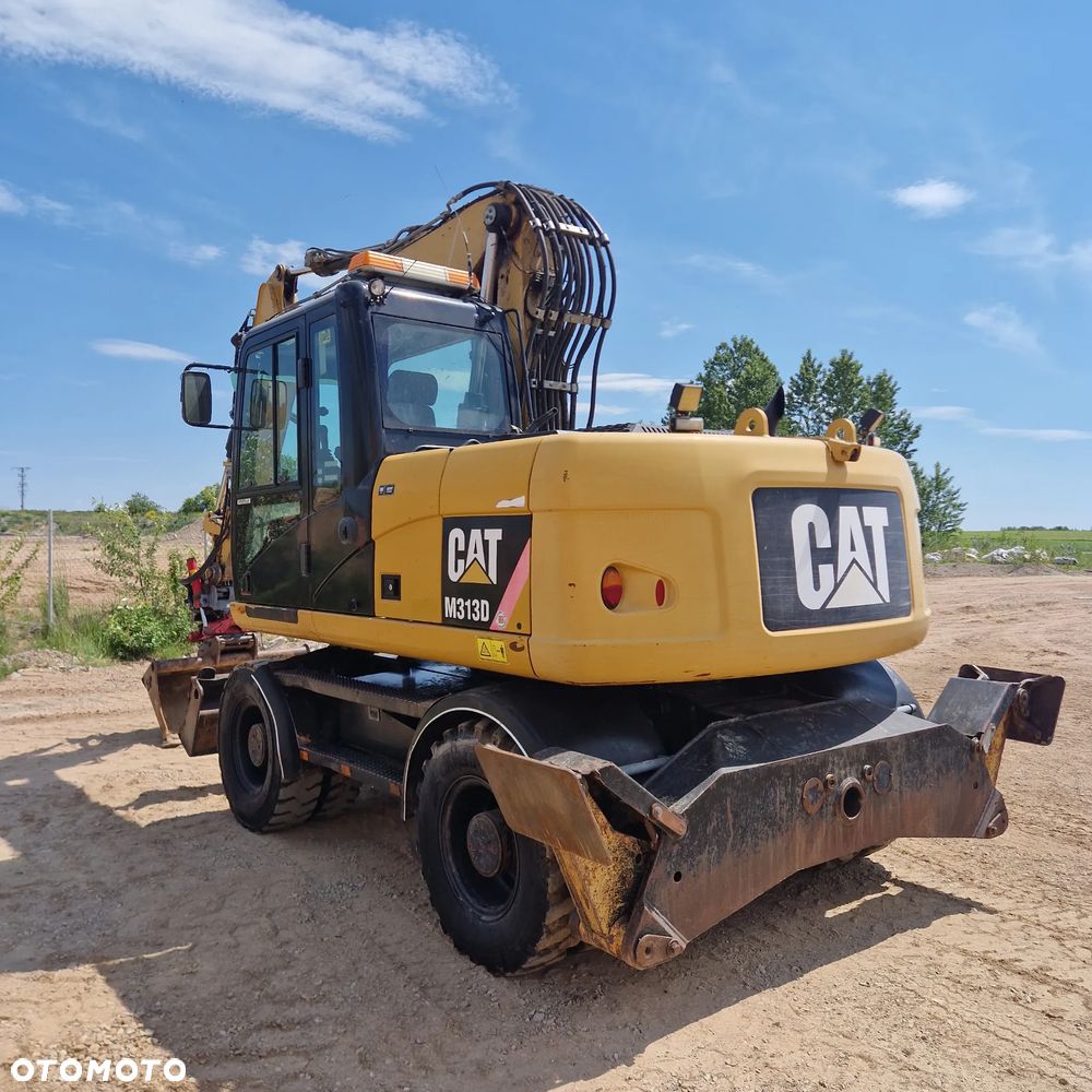 Caterpillar M313D - 4