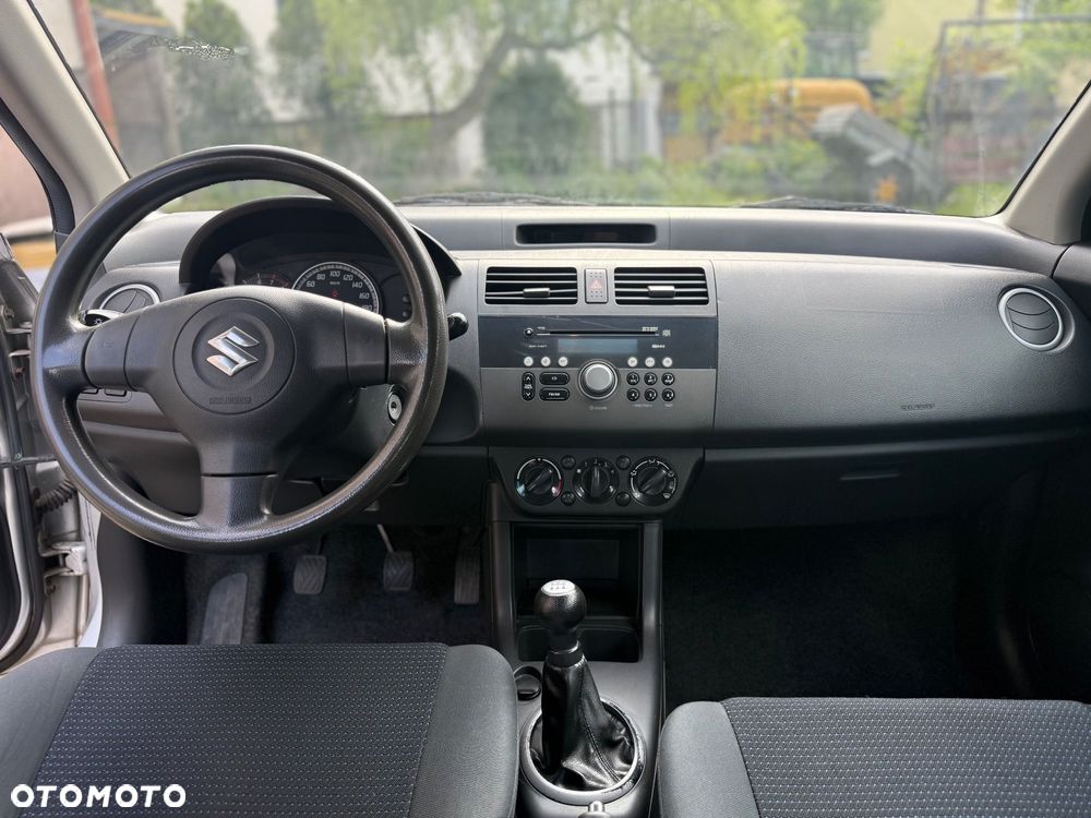 Suzuki Swift 1.3 Club - 11