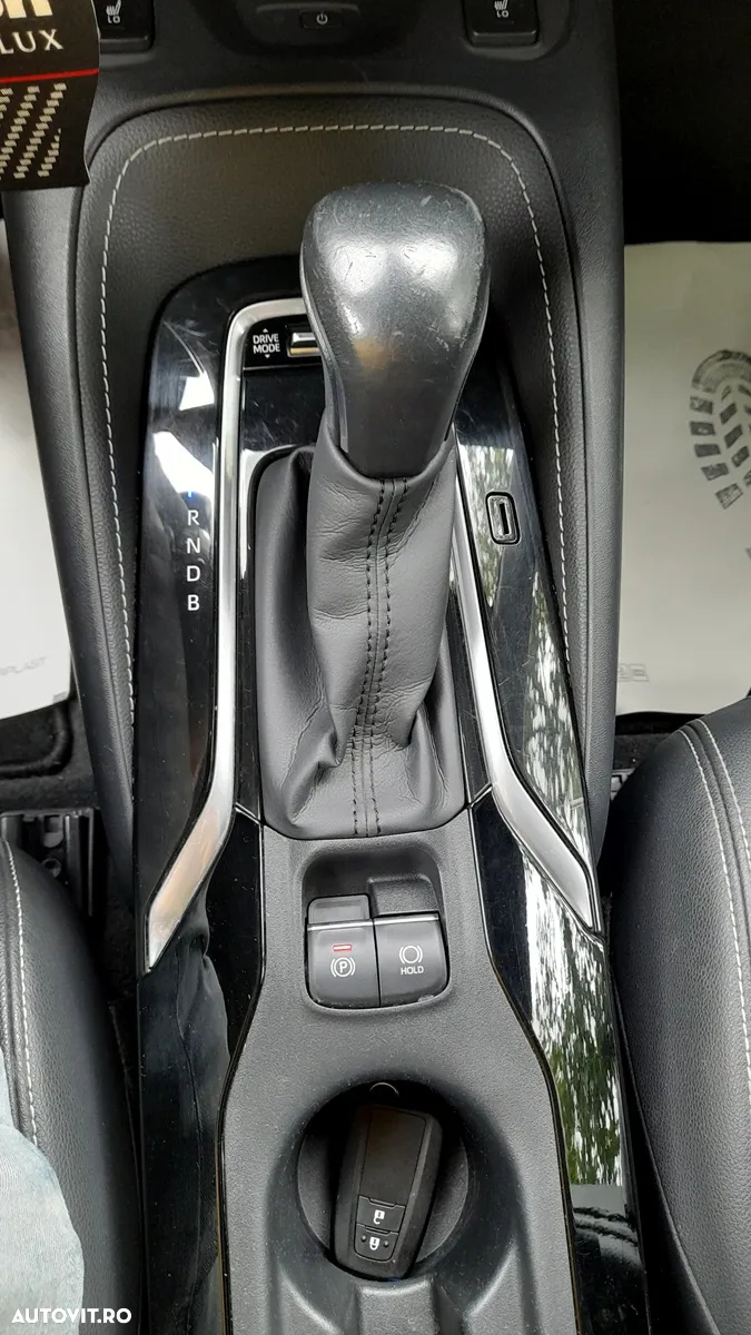 Toyota Corolla 1.8 HSD Exclusive - 32