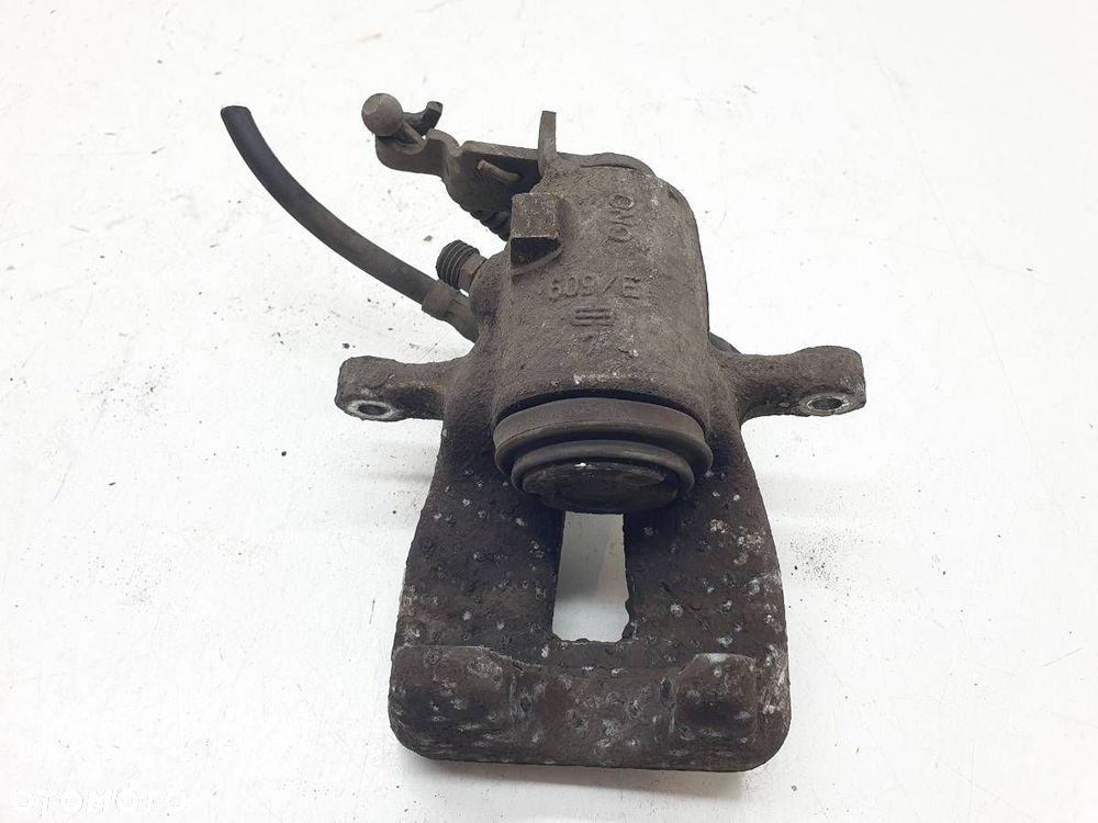 ZACISK HAMULCOWY TYŁ LEWY SKODA OCTAVIA II EU - 6