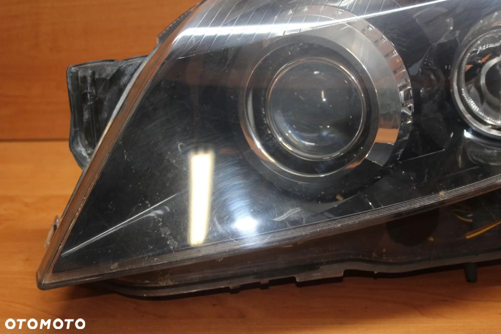 LAMPA LEWA PRZEDNIA OPEL ASTRA H BIXENON EUROPA - 2