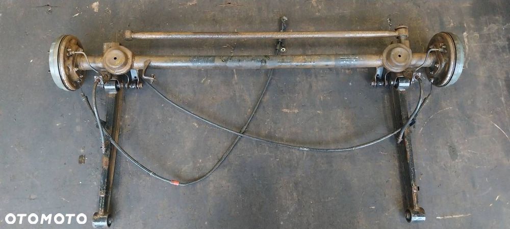 BELKA OŚ ZAWIESZENIA TYŁ BĘBNY BEZ ABS SUZUKI IGNIS I - 6