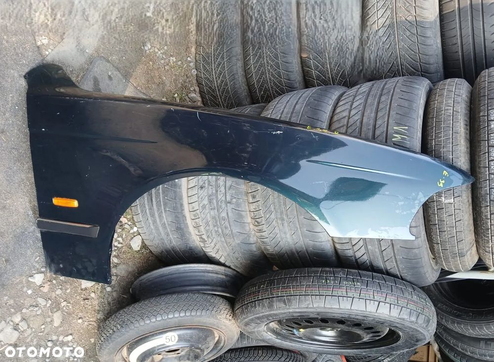 BŁOTNIK BMW E39 prawy  OE - 8