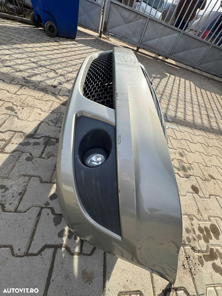 Bara fata cu grila si proiectoare Dacia Logan 2010- 2013 - 1