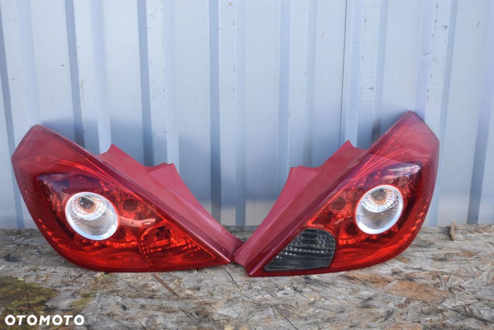LAMPA LAMPY TYŁ OPEL CORSA D 3D 2007r. - 1