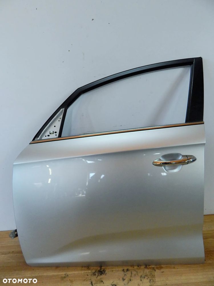 Drzwi lewy przód tył Kia Carens IV 13-19 kolor 3D srebrny  Łuków części - 3