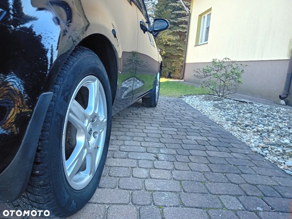 Opel Corsa 1.2 16V Enjoy - 14