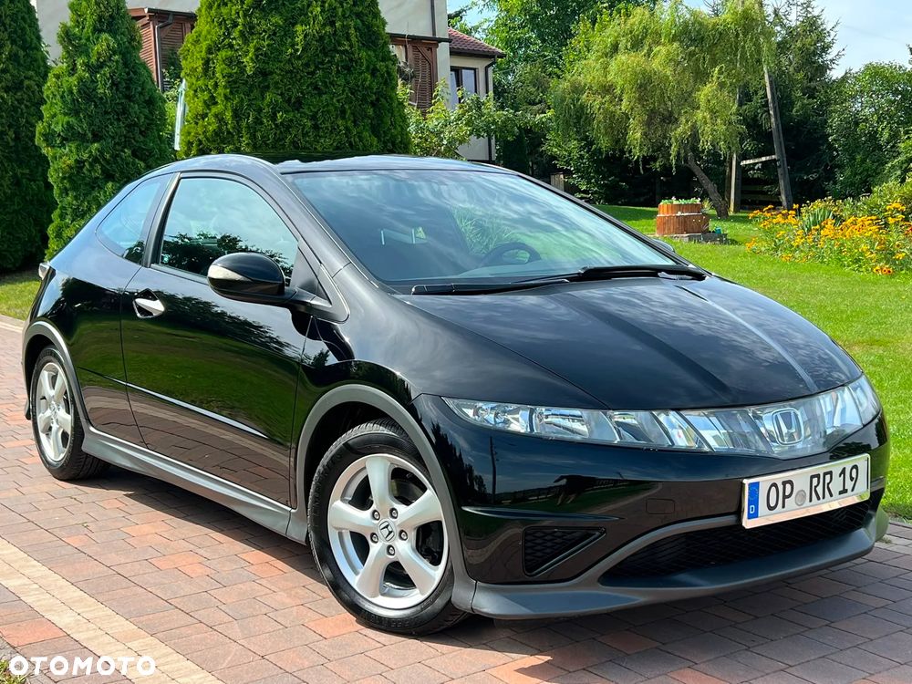 Honda Civic 1.4 i-VTEC Sport - 1