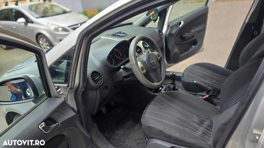 Opel Corsa 1.2i Enjoy - 11