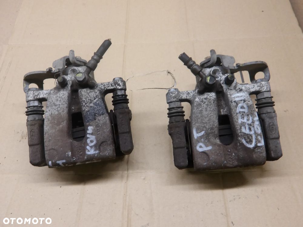 KIA CEED SW II 12-18r. 1.6 CRDI ZACISK HAMULCOWY PRAWY LEWY TYŁ - 1