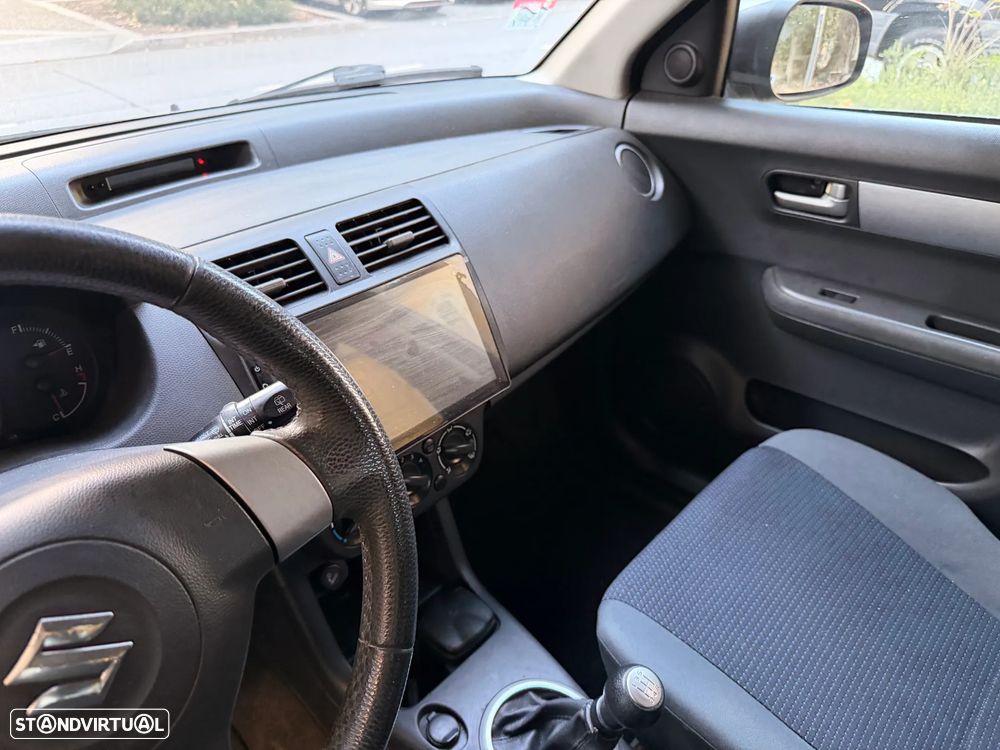 Suzuki Swift 1.3 DDiS Quiksilver - 11