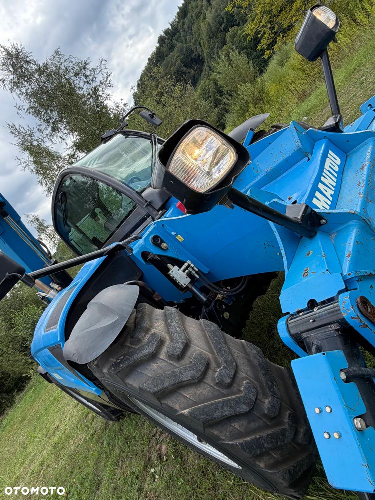 Manitou MT1440. Ładowarka Teleskopowa 14 metrów wysuw! UDŹWIG 4 TONY! Przebieg 2500 mtg. Maszyna jak Nowa z SALONU. 2017 rok. z Norwegii z Gospodarstwa rolnego! Silnik PERKINS Turbo 110 km. Aktualne Serwisy w Dekra. Nowy Model sterowane wszystko z 1 dżojstika. Ani deka luzów czy wycieku. OKAZJA! Jazda REWERS + 4 biegi. Skręt 3 tryby. Wyjście Hydrauliczne na maszcie, Poziomowanie ośi stabilizatory! Wyjścia Hydrauliczne na maszt! Okazja Ani deka luzów i wycieków. Wersja Norweska. Wielka Okazja  Opony jak Nowe! - 4