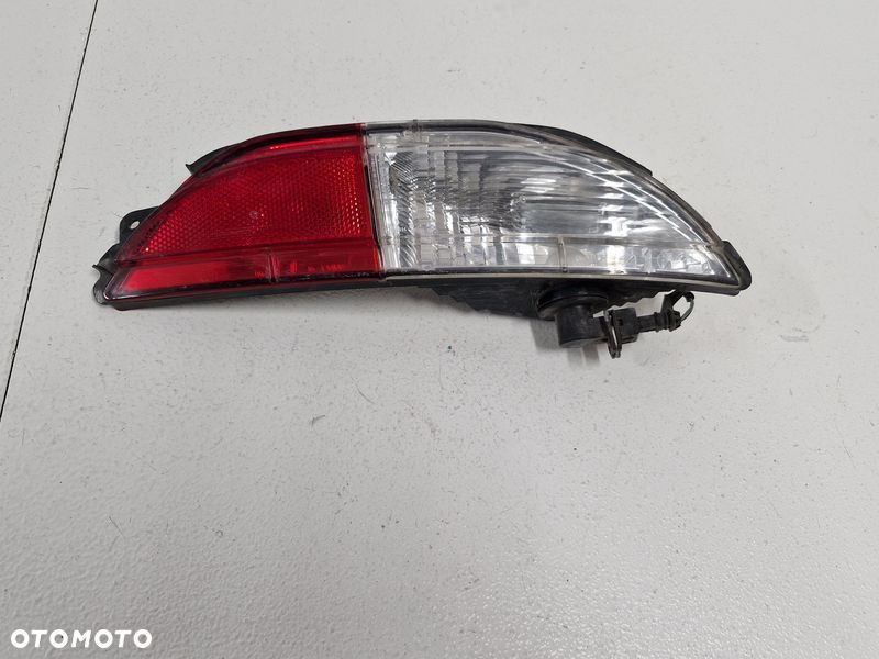 ALFA ROMEO MITO LAMPA COFANIA ŚWIATŁO W ZDERZAK HALOGEN PRAWY TYŁ 00517180110 - 9