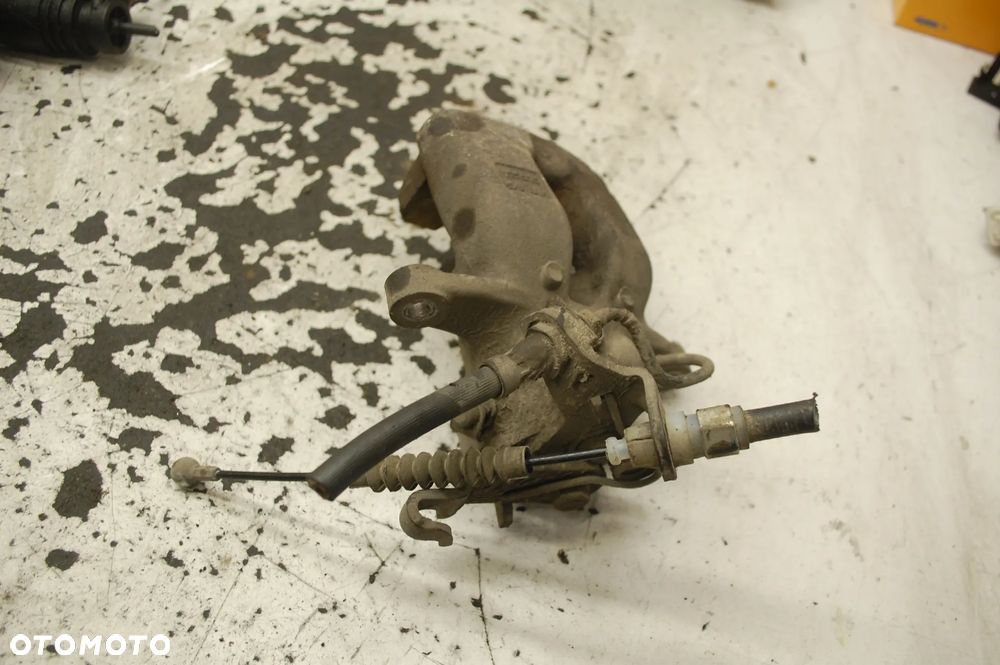 ZACISK HAMULCOWY PRAWY LUB LEWY TYŁ TYLNY SKODA SUPERB II 1.8 TSI SEAT ALTEA VW GOLF V AUDI TRW 518402 518221 - 9