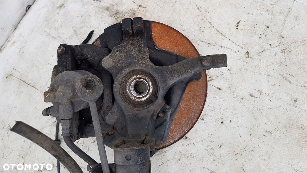 zwrotnica amortyzator lewa przód Opel Adam 1.4 - 7