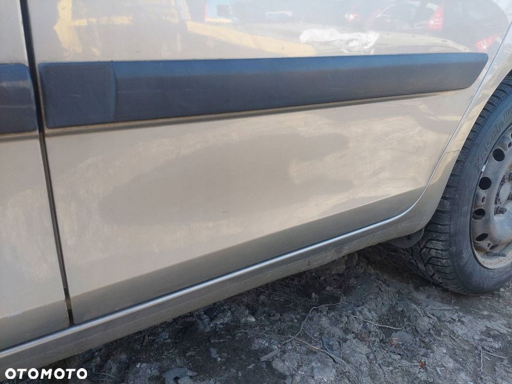 DRZWI KOMPLETNE LEWY TYŁ SKODA FABIA II KOMBI 9202 - 4