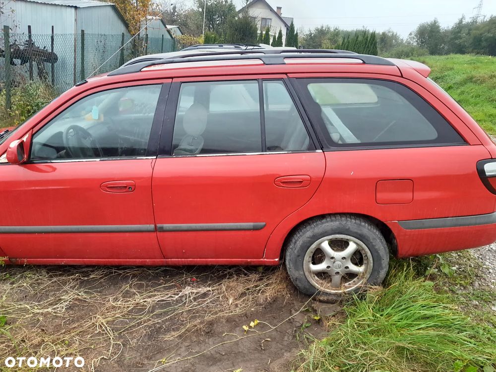 Mazda 626 GF GW 97-02   Maska lampa zderzak zamrk atrapa pas w kolor SU - 2