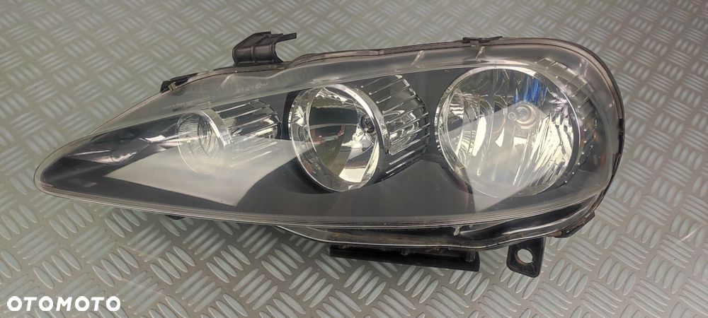 89101232SX reflektor lampa lewy lewa przód przednia ALFA ROMEO 147 LIFT EU