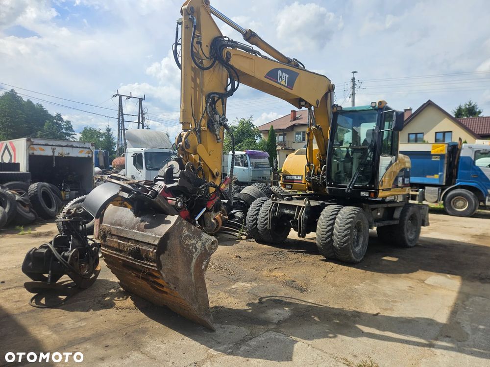 Caterpillar M313c - 1