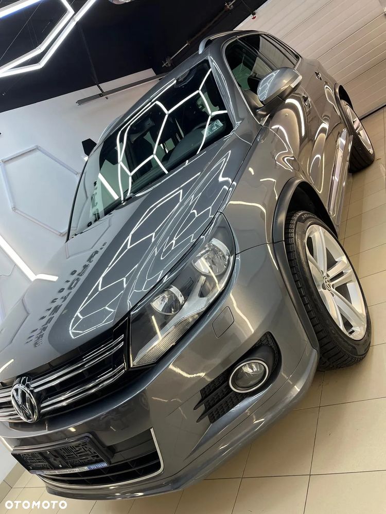 Volkswagen Tiguan 1.4 TSI 4Motion Exclusive - 1