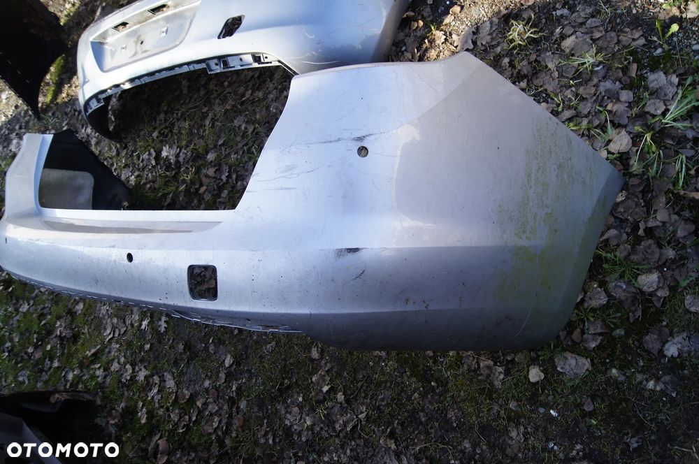 ZDERZAK TYL TYLNY OPEL ASTRA J IV KOMBI  2009-2012 - 2