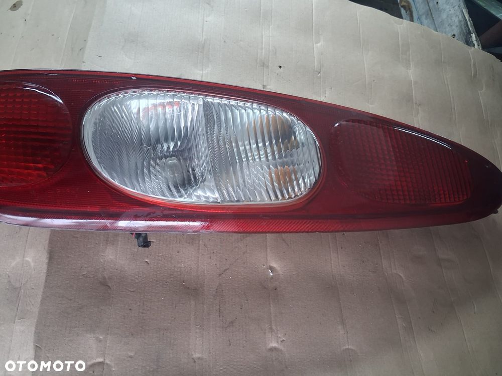 Lampa tył KIA CLARUS PARKDOWN prawa lewa  OE - 2
