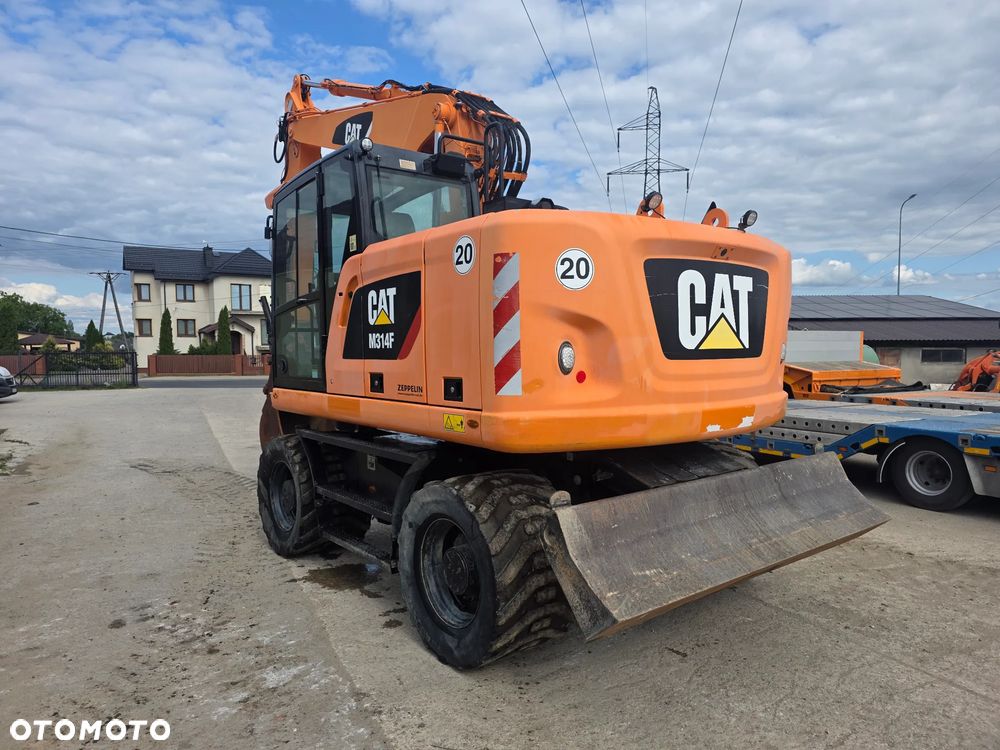 Caterpillar Cat M314F Rototil z Niemiec - 6