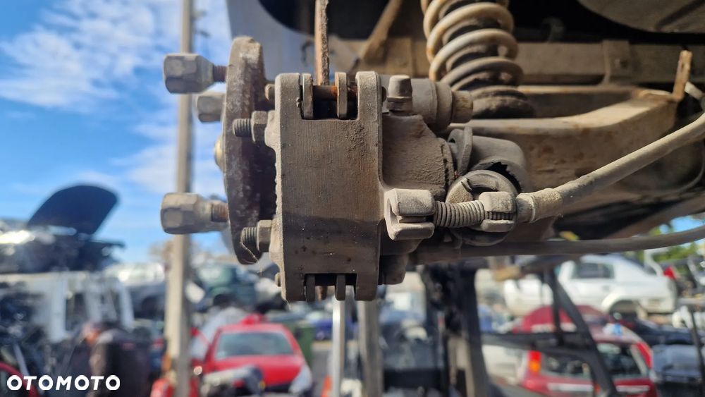 LIGIER NOVA ZACISK HAMULCOWY LEWY TYŁ - 1