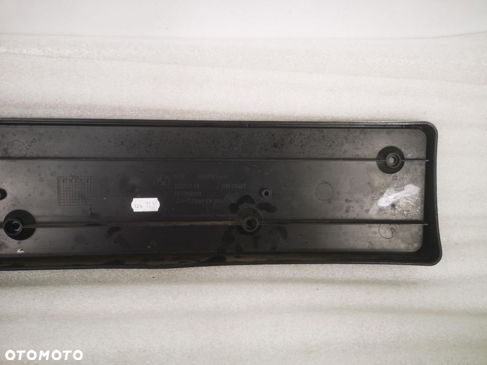 BMW E83 03- PODSTAWA PODKŁADKA POD TABLICE REJESTRACYJNĄ PRZÓD NR 51113400913-01 NR AUKCJI NK371 /2 - 3