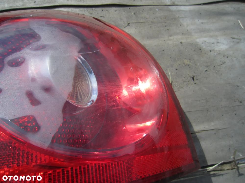Lampa tył tylna lewa VW Golf V HB 1K6945095G - 2