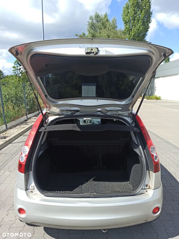 Ford Fiesta 1.4 Ghia - 11