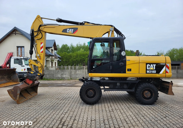 Caterpillar M 318 / z Niemiec / Tylko 10400 mth /