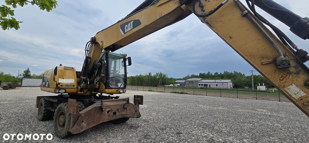 Caterpillar M318D - 7