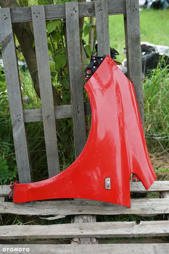 Błotnik przód przedni lewy Opel Corsa D Z547