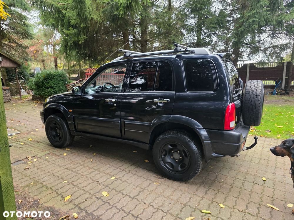 Suzuki Grand Vitara 2.0 - 7