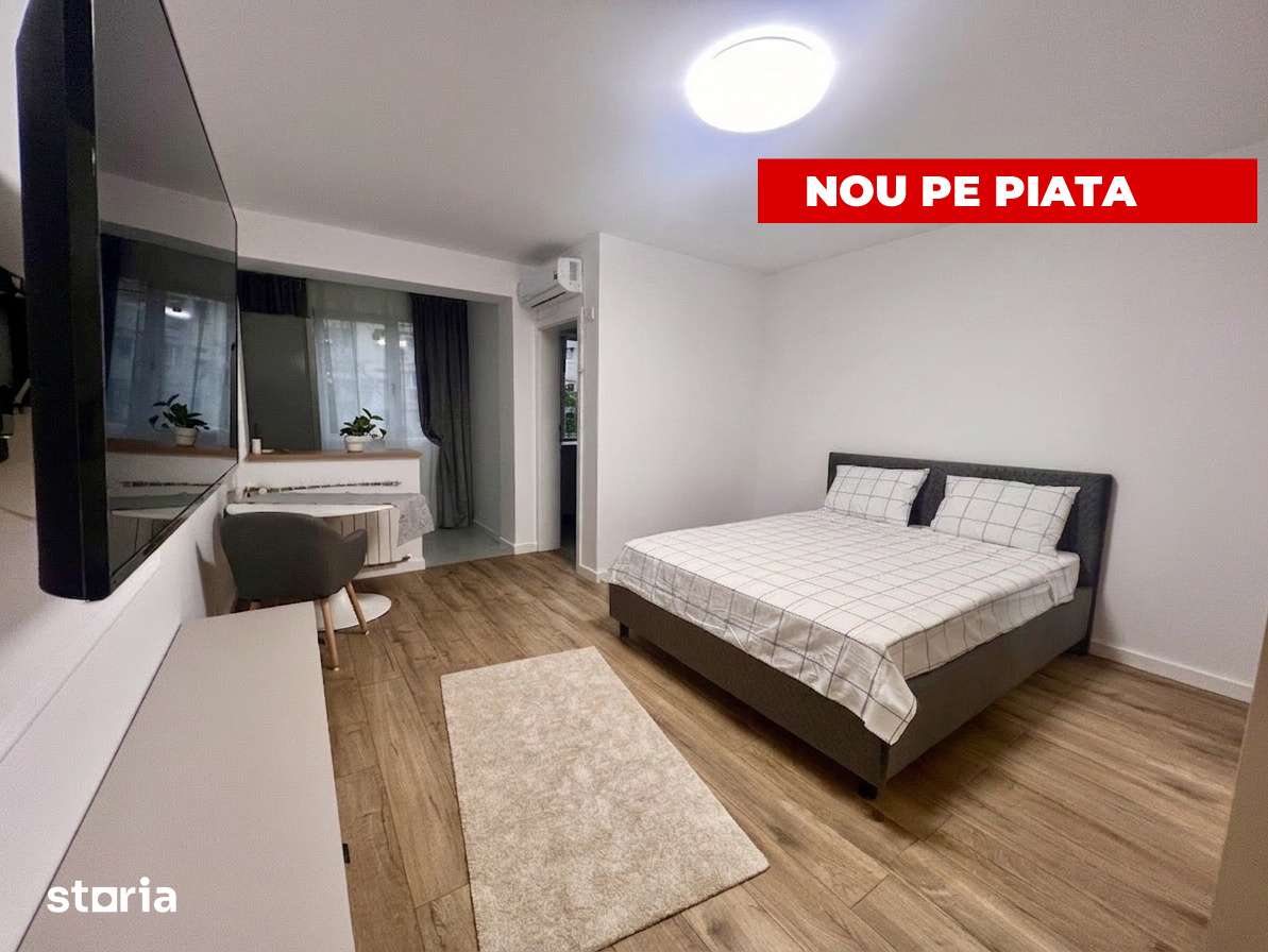 Garsoniera moderna la 500m de metrou — fotografia 1