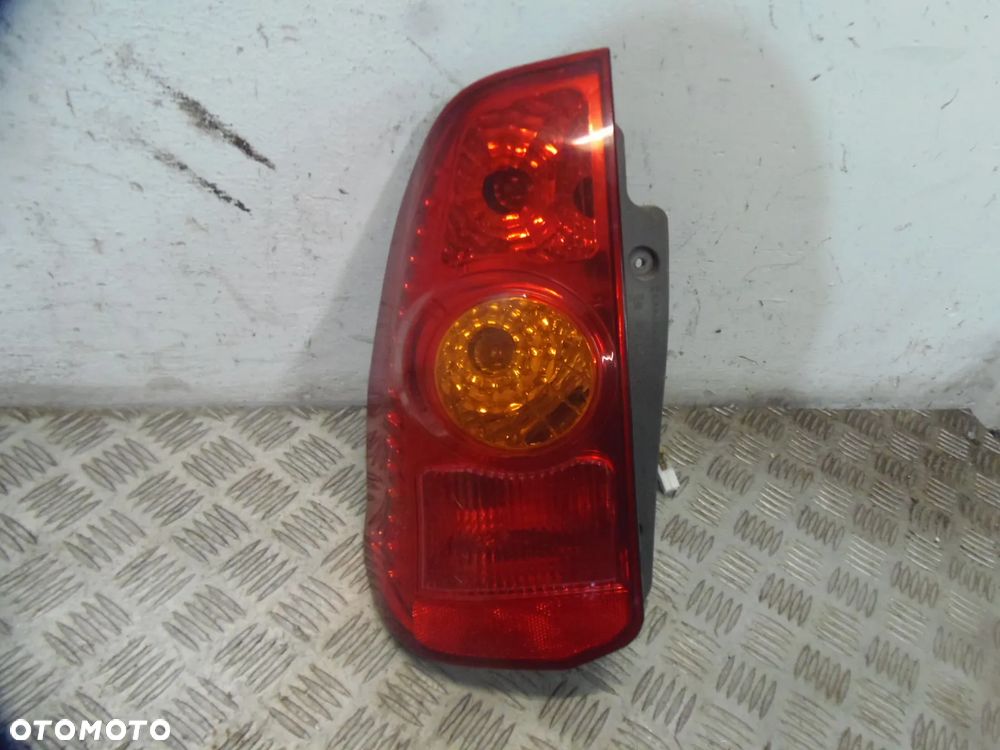 LAMPA LEWA TYLNA MITSUBISHI SPACE STAR  2005R - 1