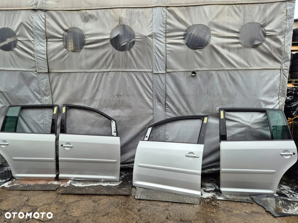 DRZWI PRZÓD/TYŁ P/L VW TOURAN KOD LAK. LA7W