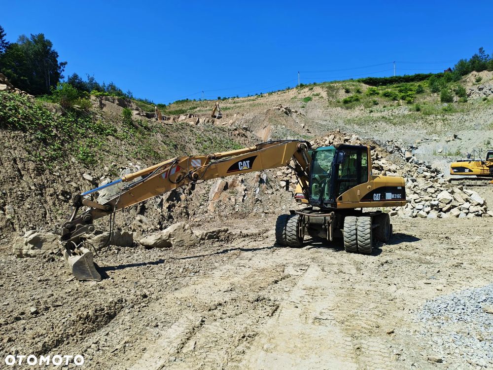 Caterpillar M316C - 1