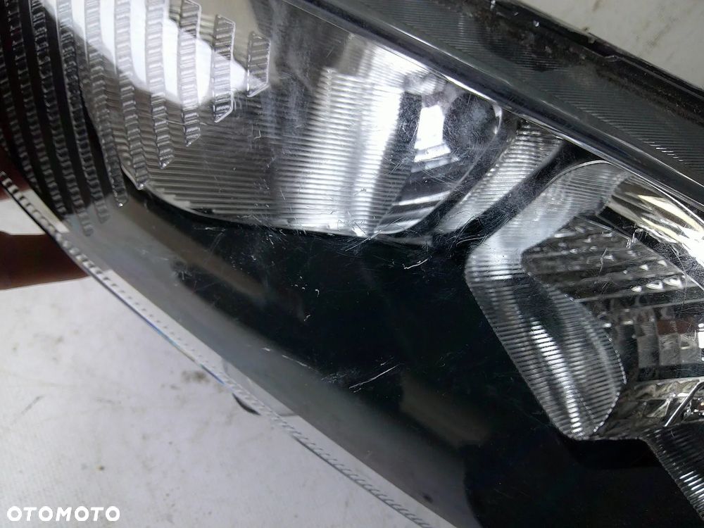 ford fiesta mk7 lampa przód lewa nowa oryg z uszk - 7