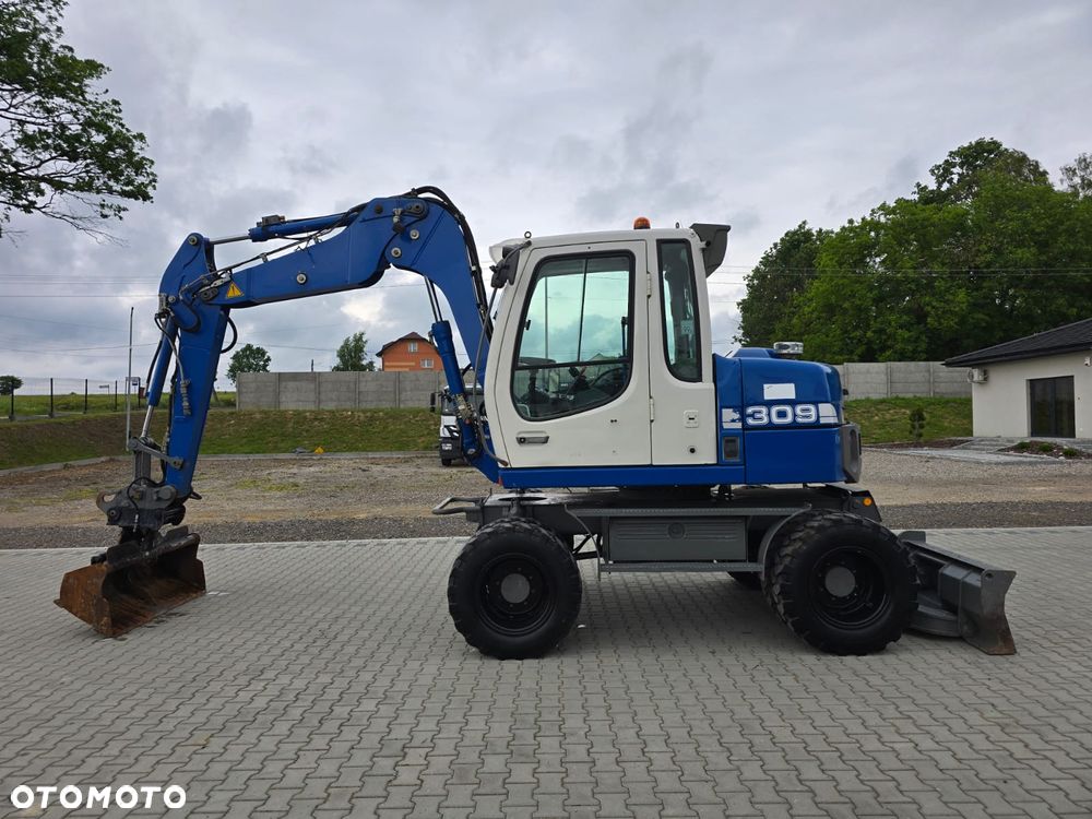 Liebherr 309 / RAMIE TRZY RAZY ŁAMANE - 8