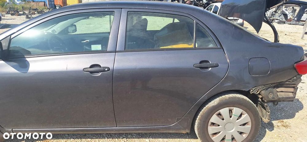 Toyota COROLLA E15 1,4D4D mcperson amortyzator prawy lewy przód - 8